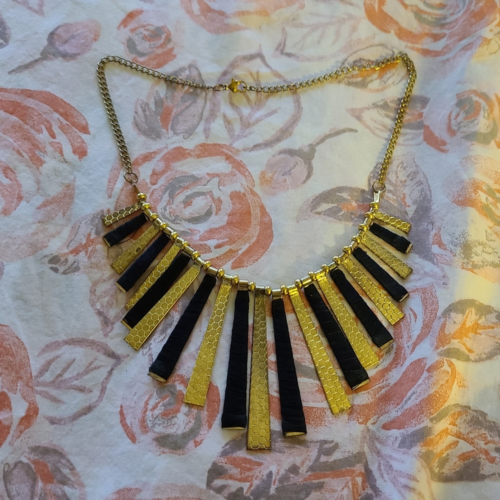 Gold and black statement necklace